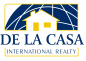 De La Casa International Realty logo